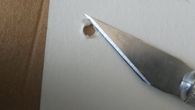 Preparing to make holes